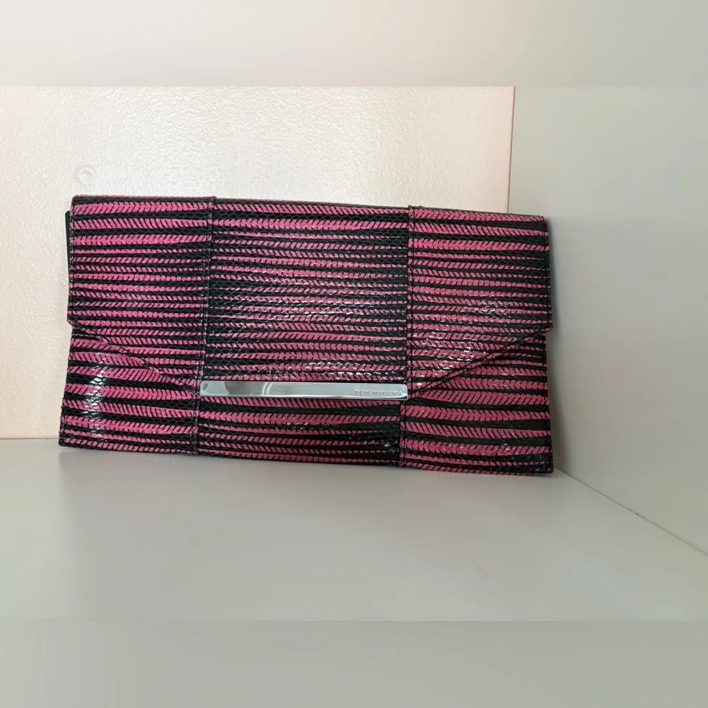 BCBGMaxazria Pink & Black Striped Clutch inside pockets with zipper. Very soft